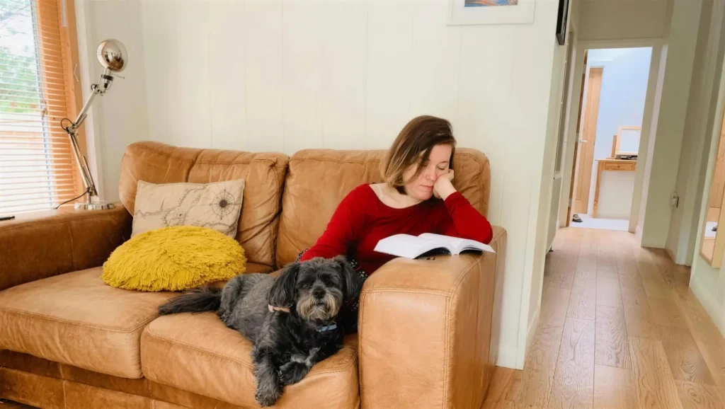Lucy at a cornwall reading retreat with her dog george